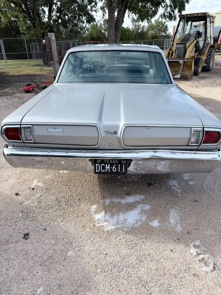 Silver classic car after a hand wash